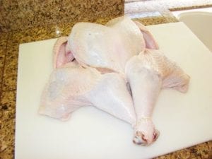 Butterflied turkey with legs tied
