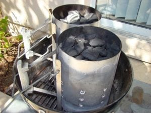 Firing two Weber chimneys of Kingsford charcoal