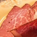 Profile view of 1mm thick pastrami slices