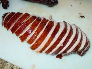 Turkey breast sliced across the grain