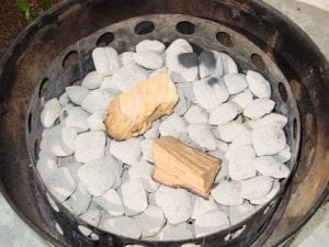 Smoke wood chunks on hot coals