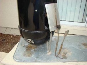 Access door propped open to make fire burn hotter