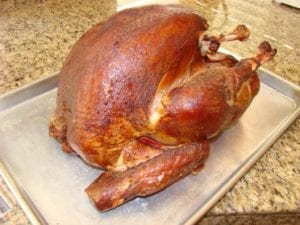 Salted whole turkey after barbecuing
