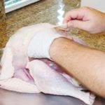 Rubbing salt on the breast meat