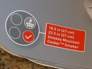 Label indicates the Weber 7471 Ash Shovel is compatible with 18.5" and 22.5" Smokey Mountain Cooker Smokers