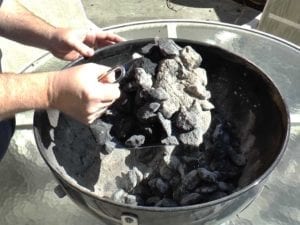 Scooping ashes using the Weber 7471 Ash Shovel