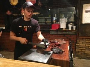 Meat is cut to order and weighed