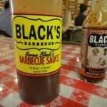 Barbecue sauce and hot sauce bottles