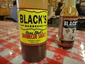 Barbecue sauce and hot sauce bottles