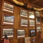 Old high school football team photos adorn the walls