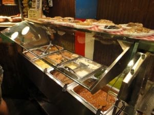 Steam table full of side dishes