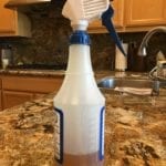 Spray bottle with apple cider vinegar for spritzing brisket