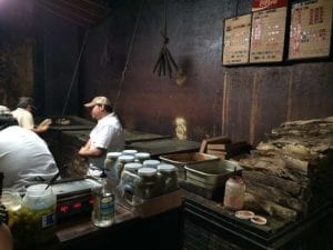 Smoke stains the walls of the pit room