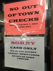 Sign says Cash Only at City Market