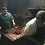 Meat cutting happens right behind the counter