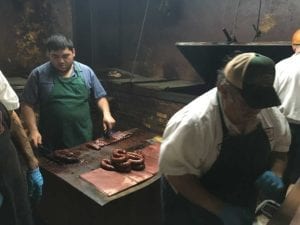 Meat cutting happens right behind the counter