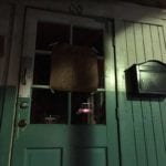 Streetlight casts shadow on Franklin Barbecue front door