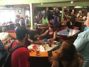 The dining room is beginning to fill with customers