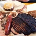 Our order at Franklin Barbecue. Clockwise from top left: chopped beef sandwich, turkey breast, pork ribs hiding under the turkey, fatty brisket, lean brisket, original sausage link, and pulled pork