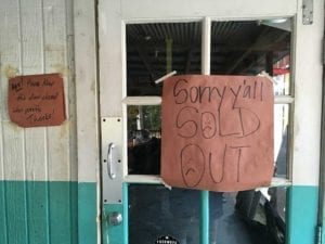 The previous day's sold-out sign is still on the front door