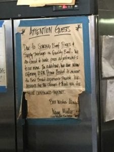 A sign warning about the high cost of USDA Prime brisket