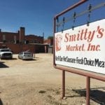 Smitty's Market sign and parking log