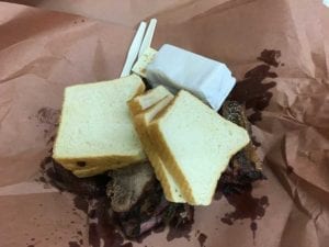 Our bundle of meat, bread and crackers wrapped in butcher paper
