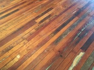 Old wooden floors in overflow dining room