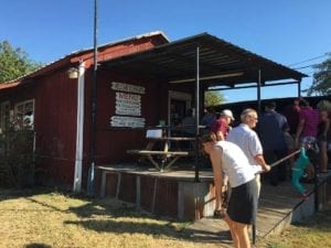 People lining up outside Snow's BBQ