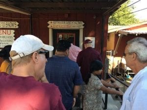 Waiting on the porch at Snow's BBQ
