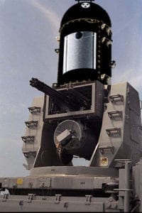 This declassified U.S. Navy photo shows a highly modified MK 15 Phalanx Close-In Weapons System (CIWS). The "sea-whiz" consists of a rotating cluster of six barrels capable of firing up to 4,500 red-hot coals per minute. A Navy spokesman, speaking off-the-record, said, "Lump burns hotter, but briquettes offer more firepower." By Chris Allingham