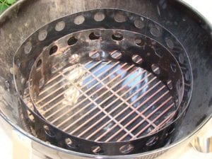 Nested charcoal chambers inside bowl