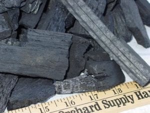 Piece of wood flooring in Duraflame lump