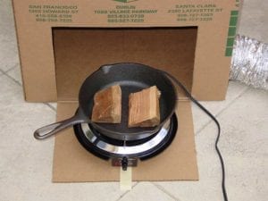 Putting hot plate and skillet into the box