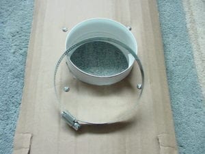 Mounting draft blocker to cardboard door