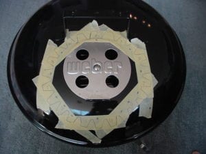Marked masking tape on lid for drilling holes