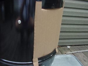 Cardboard access door on the cooker