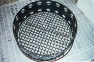 Two crossed charcoal grates