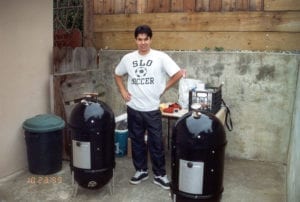 SLO Roaster posing with twin Bullets