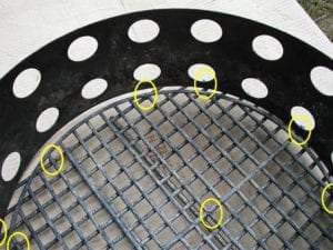 Smaller grate and charcoal chamber wired to original WSM grate
