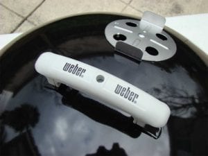 Top lid handle and vent damper