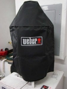 Smoker under vinyl cover