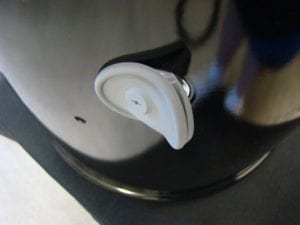 Inserting grommet into middle cooking section