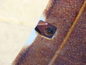 Close-up of access door latch