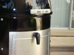 View of lid edge handle and access door
