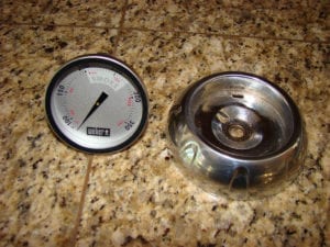 Thermometer and bezel removed from lid