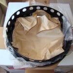 Heat shield wrapped in paper