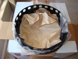 Heat shield wrapped in paper