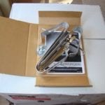 Legs, grate support straps, hardware pack, and owner's manual
