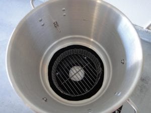 View into Mini WSM of charcoal chamber and vent cover